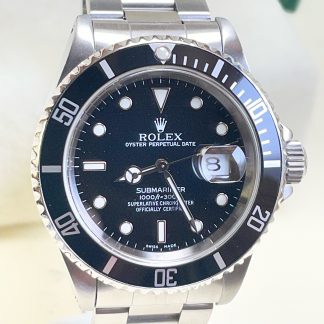 Rolex Submariner #16610 - Box & Papers